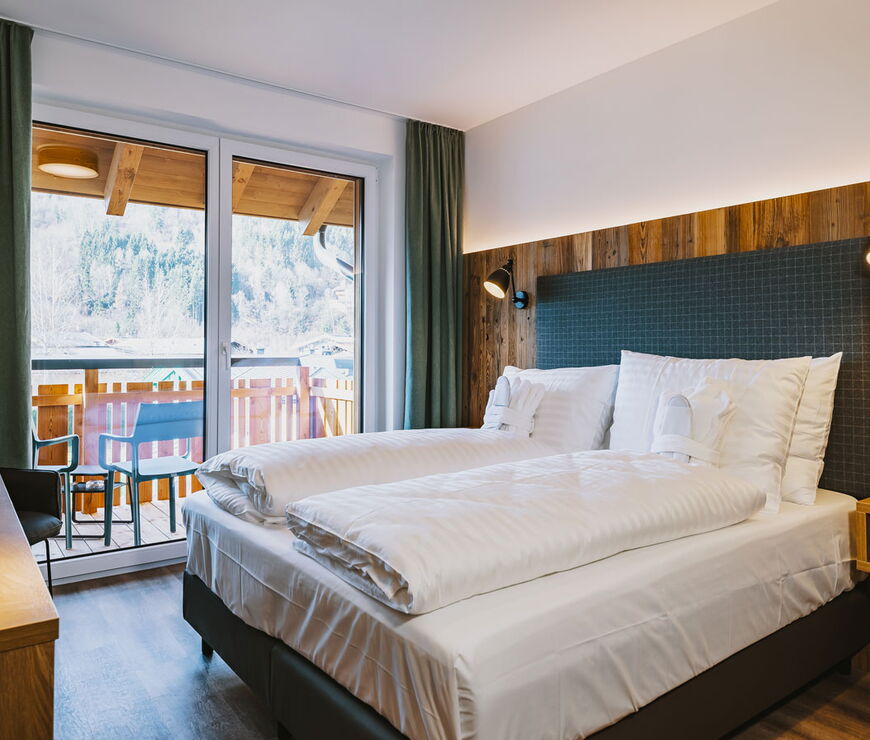 Room with balcony in the Elements Resort Zell am See